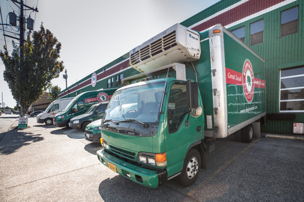 Elephants Delicatessen Central Kitchen lot with Elepahnts trucks and vans ck truck