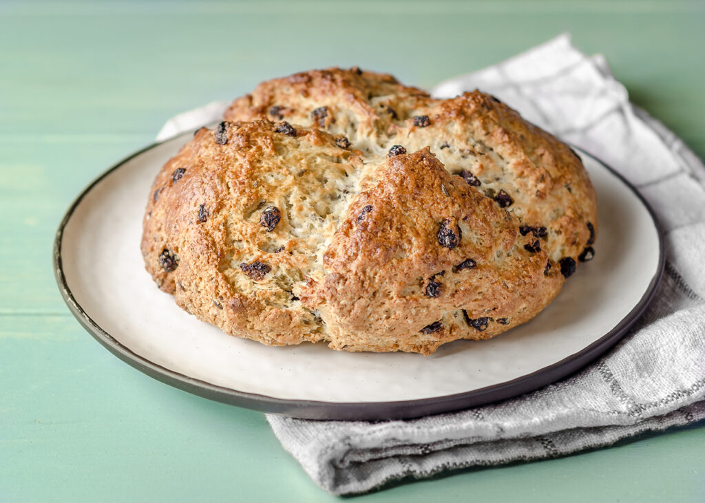 Soda Bread on a white towel and green table