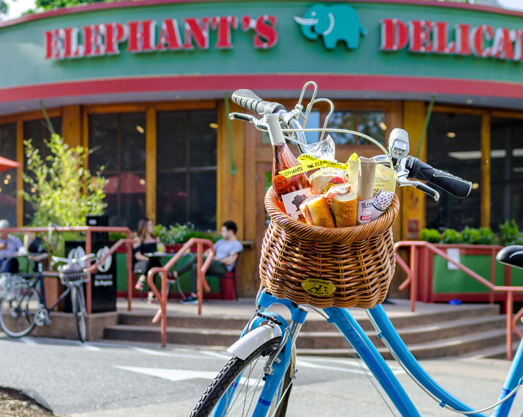 bike with a picnic basket in front of Elephants Delicatessen at NW 22nd