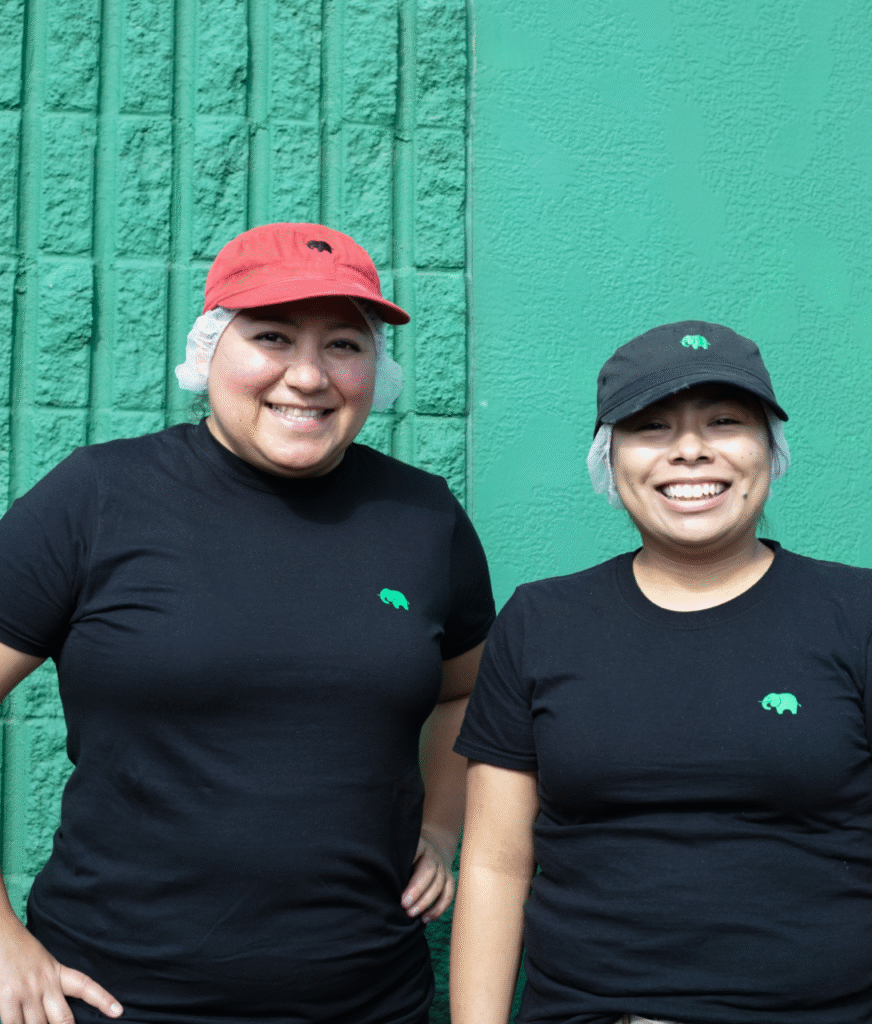 Elephants employees standing outside of Elephants Central Kitchen